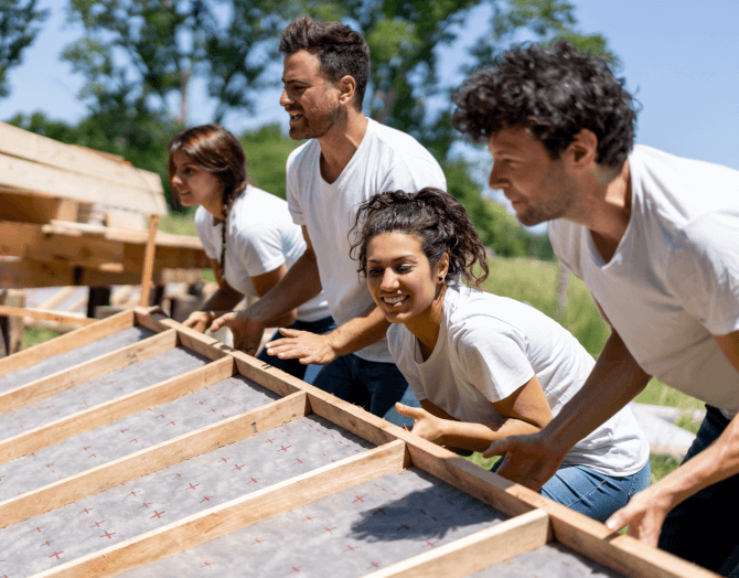 Volunteers building a home